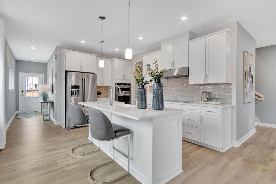 Furnished interior in a model home at Carpenters Pointe in Cary (Image 4).