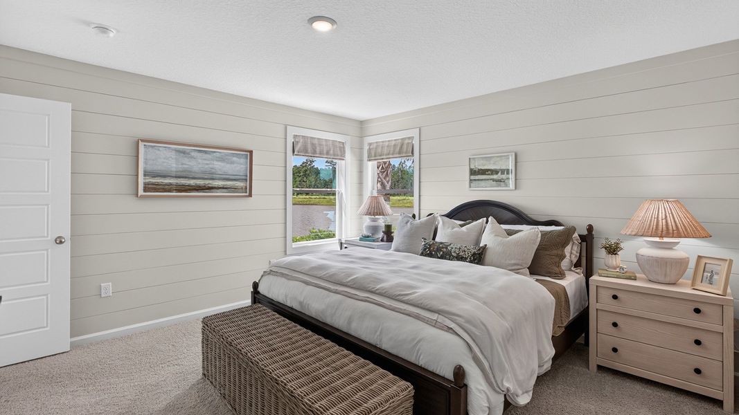 Furnished interior in a model home at Liberty Cove in Yulee (Image 11).