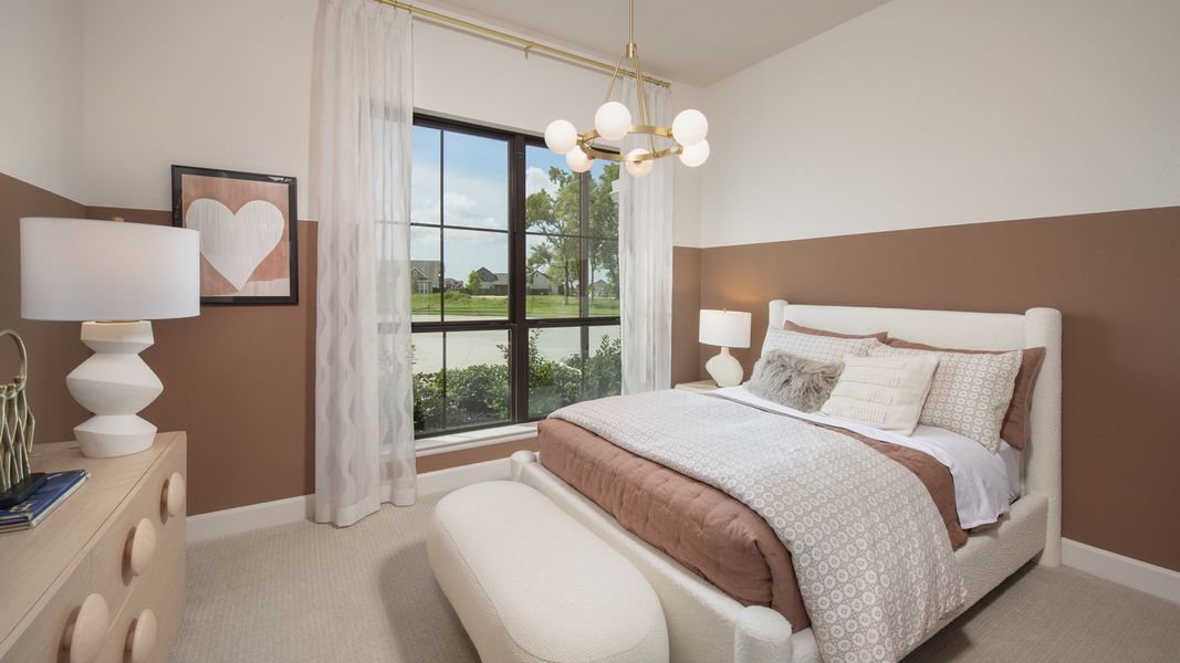 Furnished interior in a model home at Riceland 70' in Mont Belvieu (Image 18).