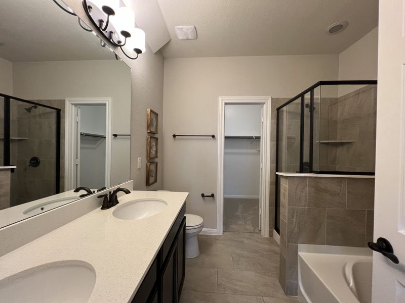 Furnished interior in a model home at Summerlyn in Leander (Image 26).