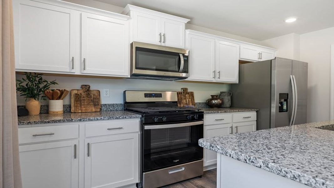 Furnished interior in a model home at Harrier Point in Woodruff (Image 13).