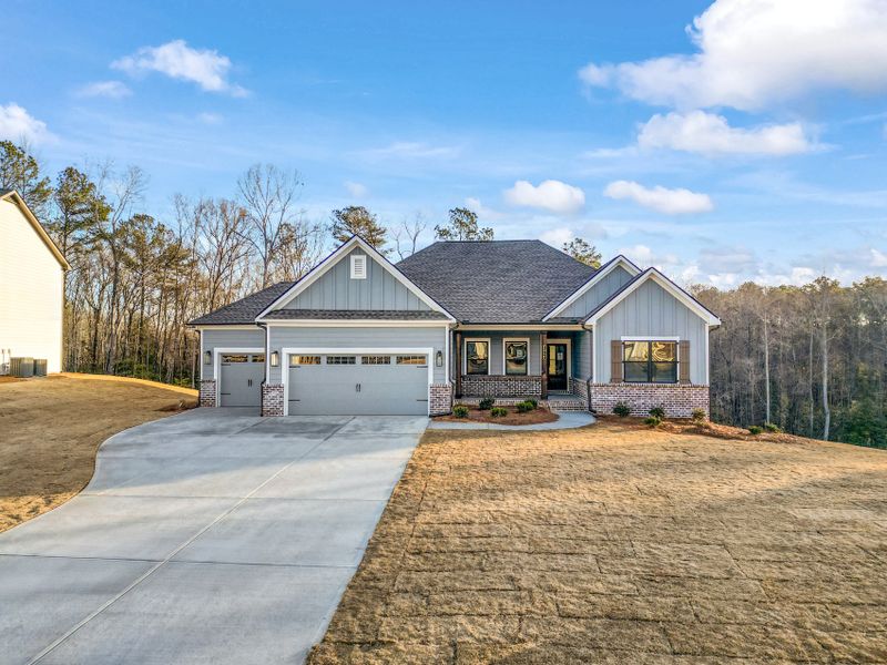 Front exterior of a home in the Red Oak Ridge community, located in Loganville, GA (Image 3). Front exterior of a home in the Red Oak Ridge community, located in Loganville, GA (Image 3).