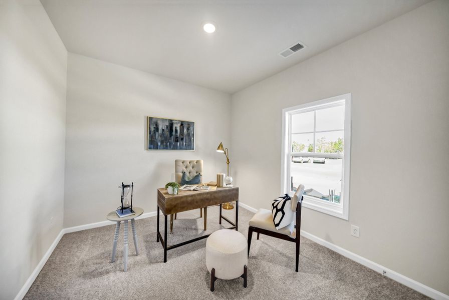 Furnished interior in a model home at Portrait Hills in Aiken (Image 50).