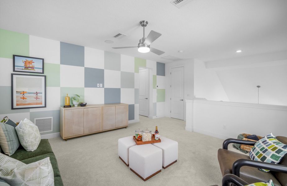Furnished interior in a model home at Mariposa at EverRange in Jacksonville (Image 22).