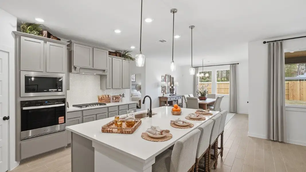 Furnished interior in a model home at The Woods in Lumberton (Image 10).