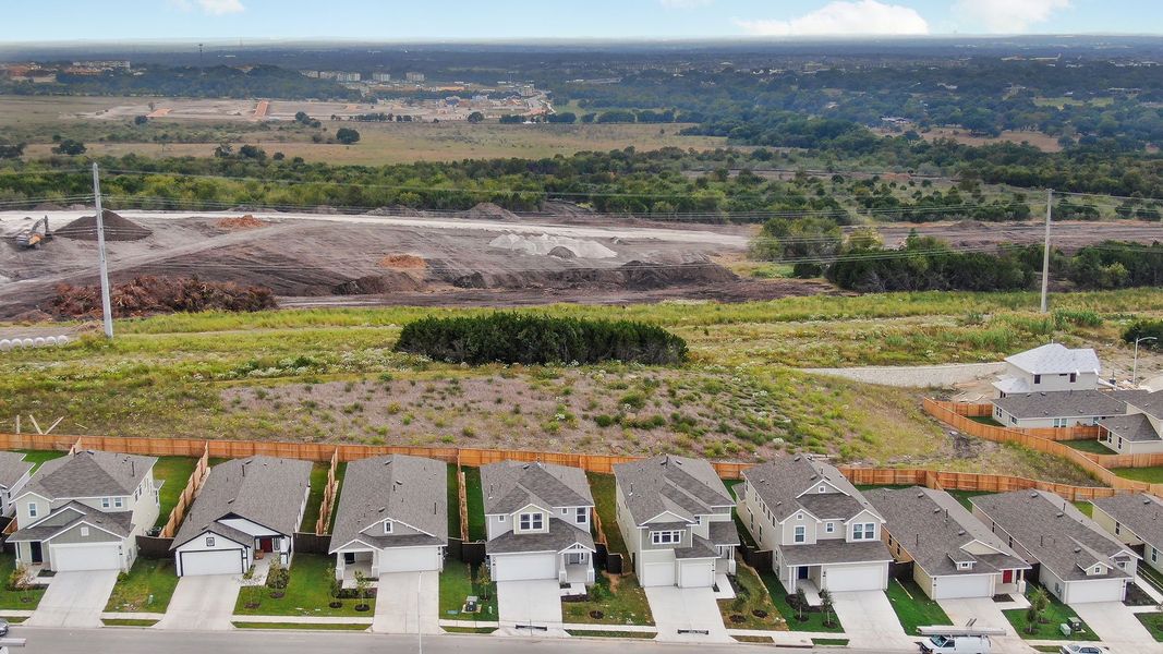 Aerial view of the Cloverleaf community in Austin, TX, showing layout and nearby surroundings (Image 11).