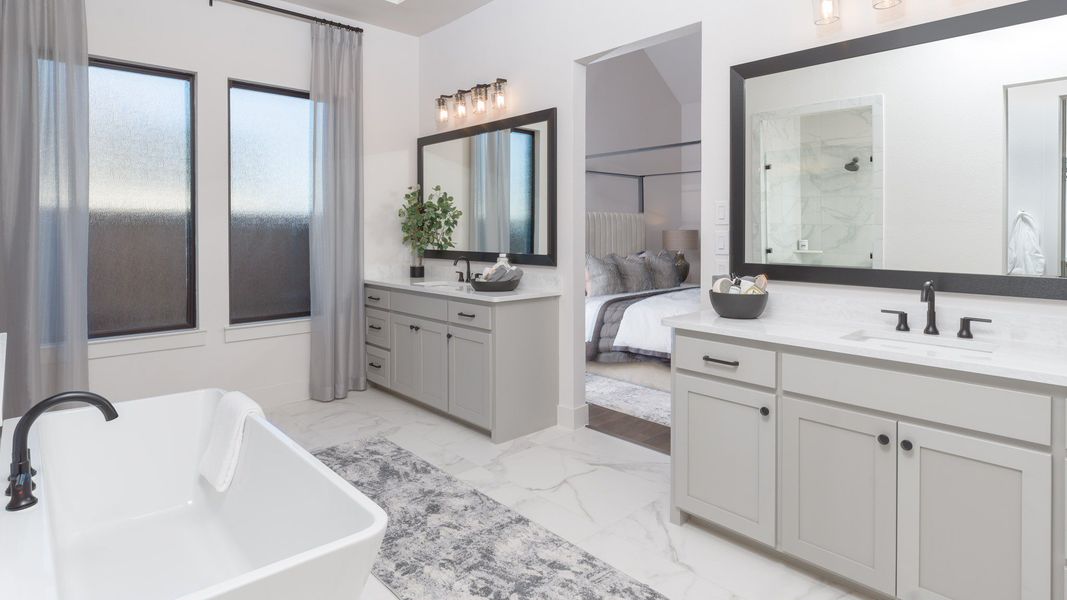 Furnished interior in a model home at Walsh Ranch 60' in Aledo (Image 15).