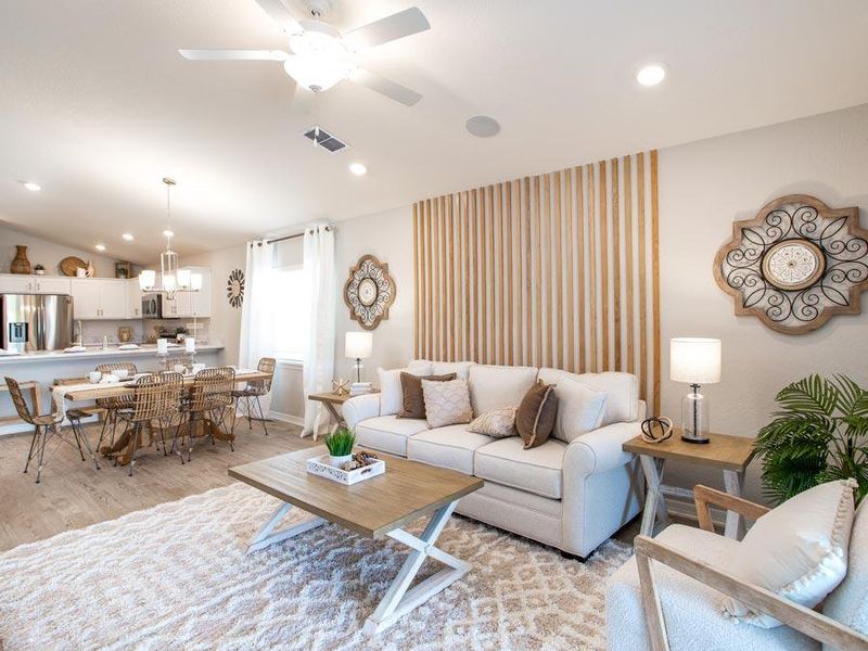 The budget-friendly Amaryllis includes a bright and open living area - Amaryllis home plan