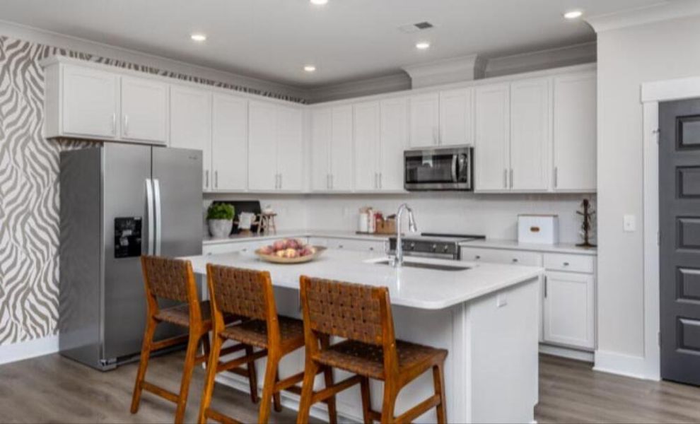 Furnished interior in a model home at Black Forest Pointe in Benson (Image 5).