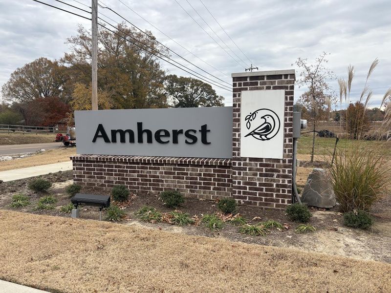 Entrance to the Amherst community in Cordova, TN, featuring signage and landscaping (Image 1).