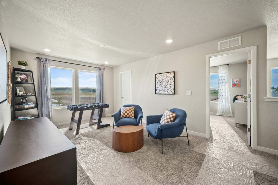 Furnished interior in a model home at Aspen Ranch in Fountain (Image 10).