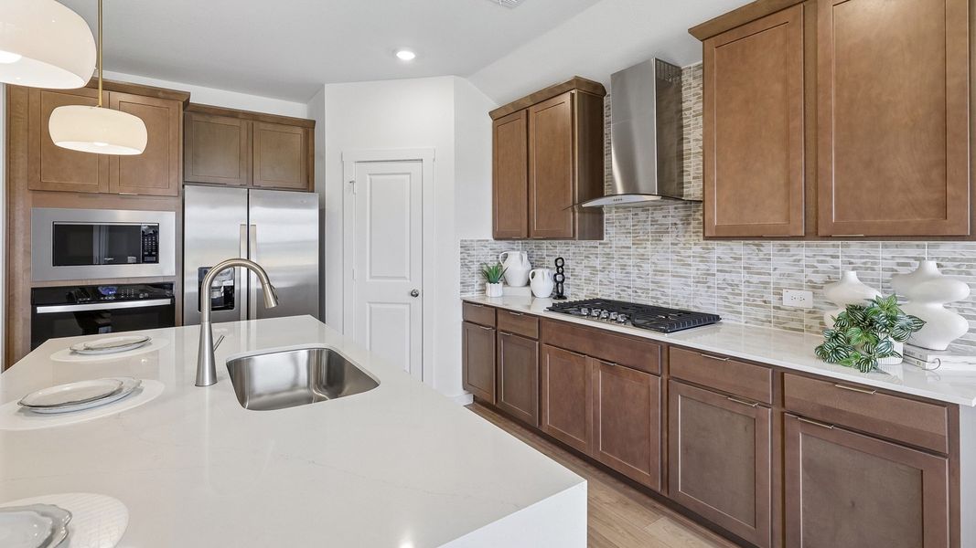 Furnished interior in a model home at Monarch Ranch in Manor (Image 20).