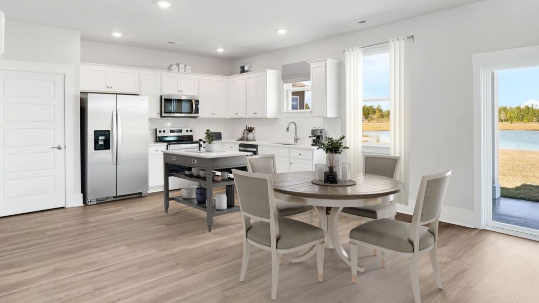 Furnished interior in a model home at The Pines at Blake Farm in Wilmington (Image 9).