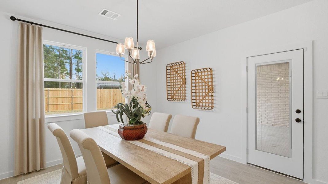Furnished interior in a model home at The Woods in Lumberton (Image 11).