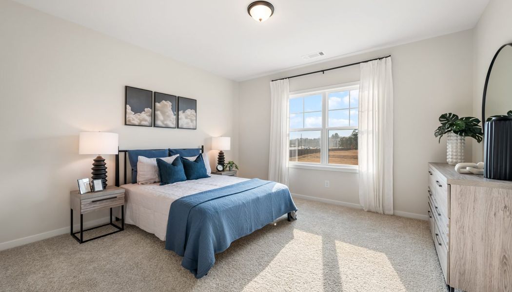 Furnished interior in a model home at Pinecrest Ridge in Dacula (Image 36).