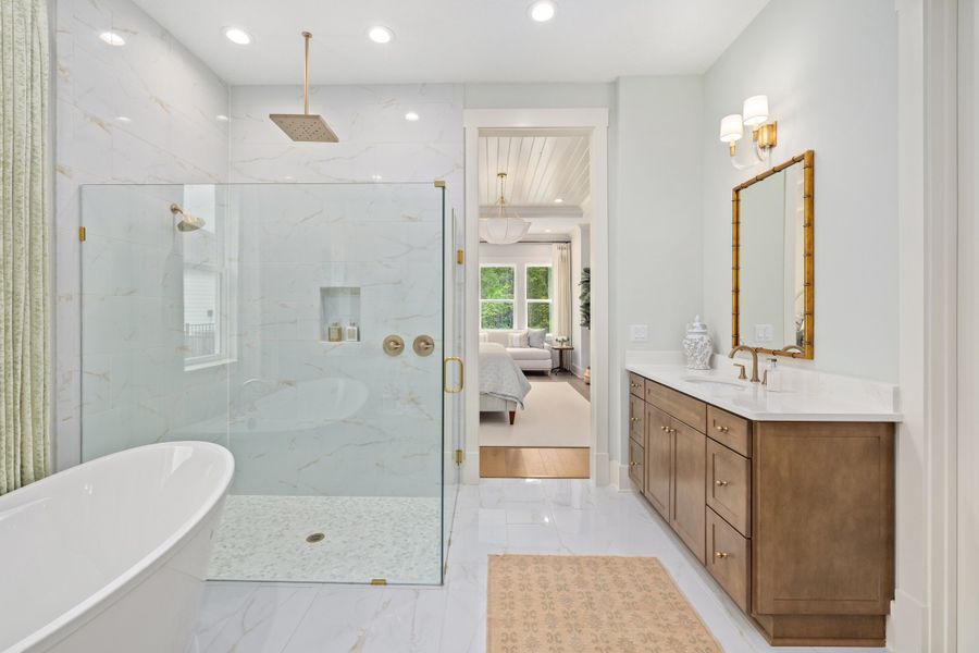 Furnished interior in a model home at Hidden Creek at SilverLeaf 80' Gold Series in St. Augustine (Image 71).