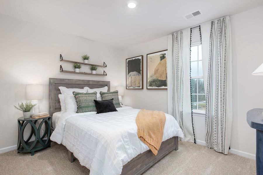 Furnished interior in a model home at Ridge Pointe in Trinity (Image 31).
