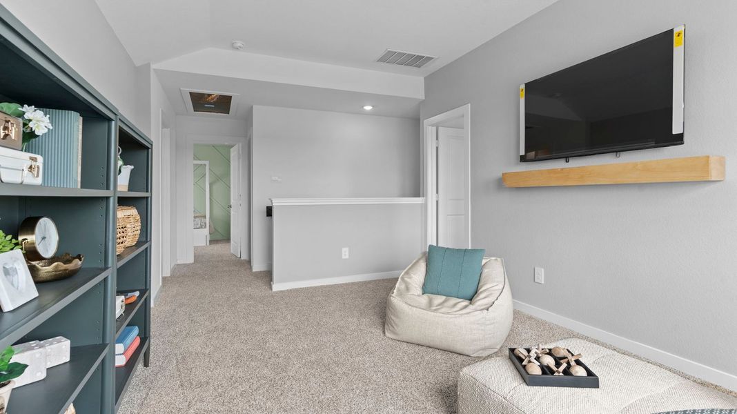 Furnished interior in a model home at Lakes at Westland Ranch in League City (Image 27).