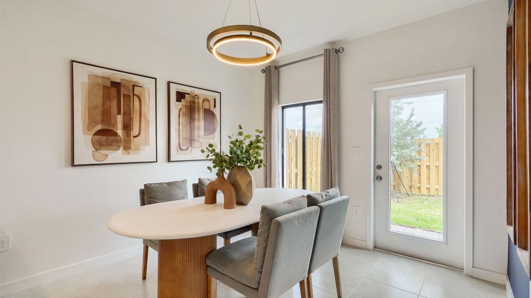 Furnished interior in a model home at Juniper Cove in Homestead (Image 14).