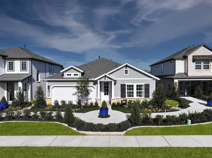 Front exterior of a home in the The Meadows community, located in Denton, TX (Image 3).