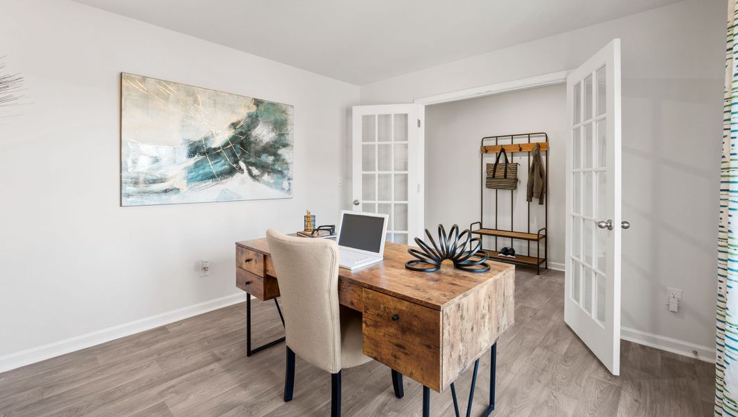 Furnished interior in a model home at Paddock Point in Roebuck (Image 5).