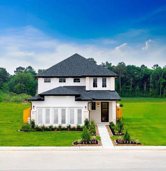 Front exterior of a home in the Granger Pines community, located in Conroe, TX (Image 2).