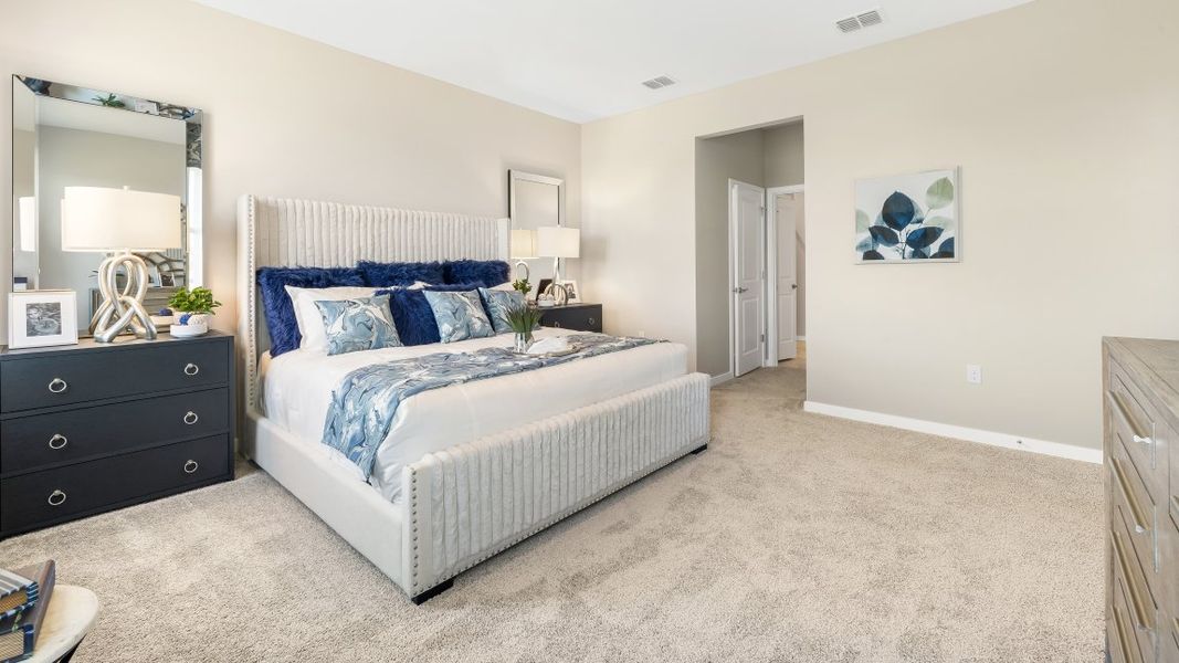 Furnished interior in a model home at Coral Lakes - Tradition & Express in Punta Gorda (Image 26).