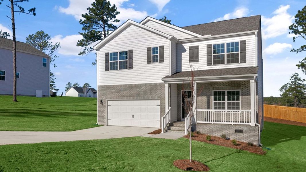 Front exterior of a home in the Gretchen Pines community, located in West End, NC (Image 13). Front exterior of a home in the Gretchen Pines community, located in West End, NC (Image 13).