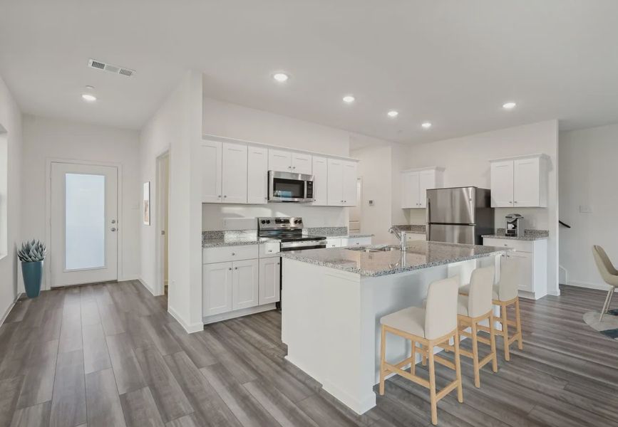 Furnished interior in a model home at Broadmoor Village in Cedar Hill (Image 8).