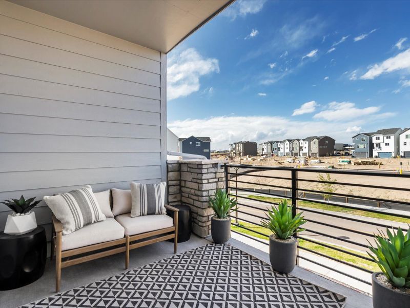 Front exterior of a home in the The Commons at Victory Ridge community, located in Colorado Springs, CO (Image 8).