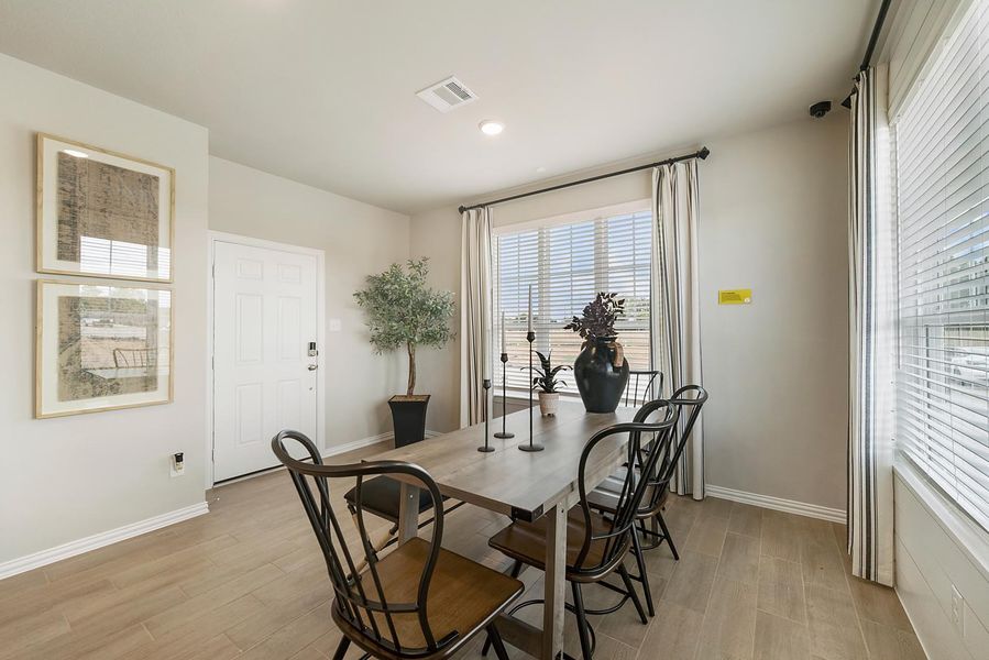 Furnished interior in a model home at Seven Oaks Townhomes in Tomball (Image 14).