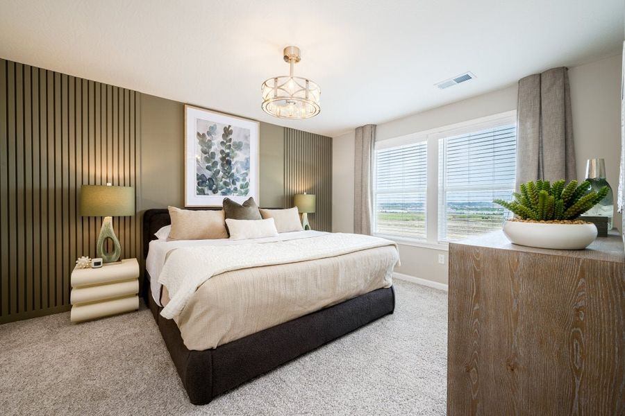 Furnished interior in a model home at Coral Cove in Panama City Beach (Image 11).