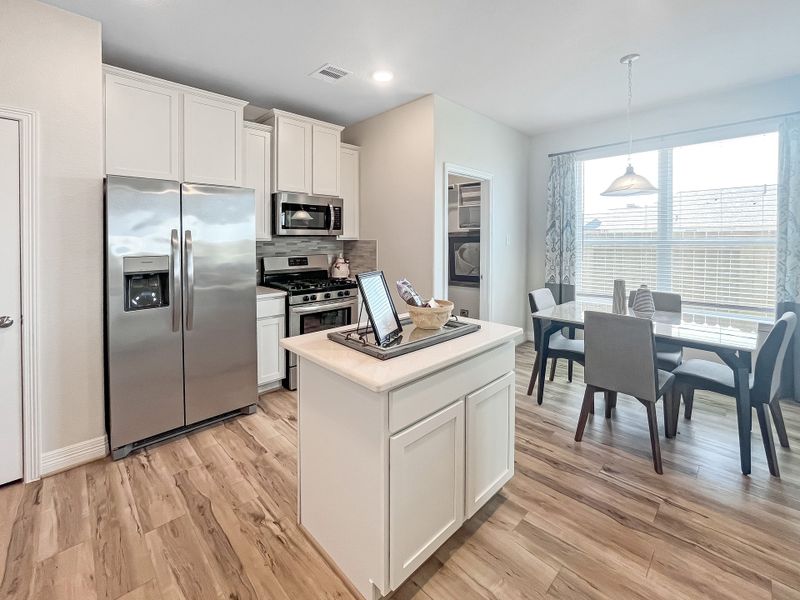 Furnished interior in a model home at Trails at Woodhaven Lakes in La Marque (Image 5).