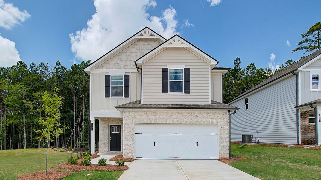 Front exterior of a home in the Enclave at Evergreen community, located in Fairburn, GA (Image 12). Front exterior of a home in the Enclave at Evergreen community, located in Fairburn, GA (Image 12).