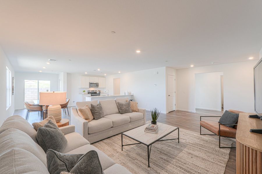 A living room with a couch and a coffee table.