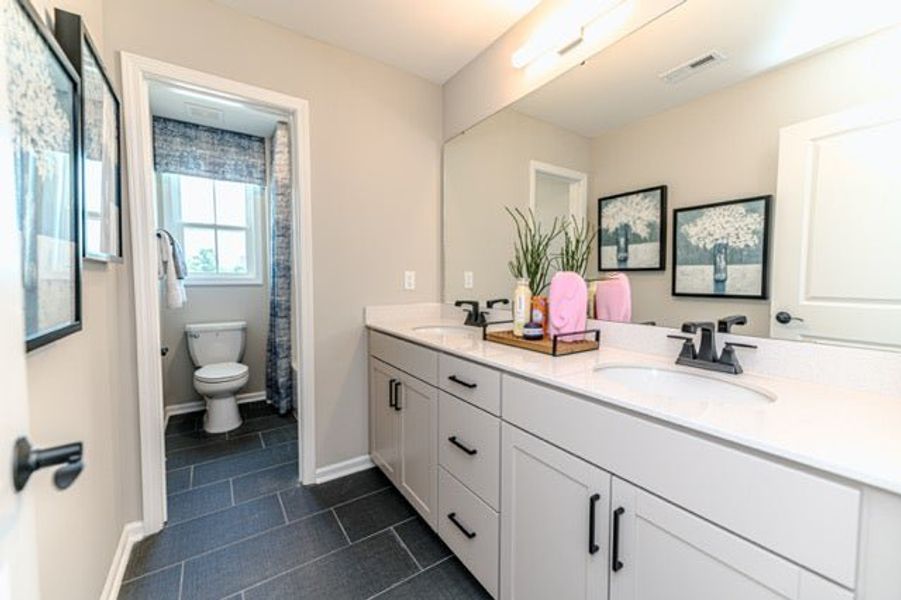 Furnished interior in a model home at Pembroke in Hope Mills (Image 40).