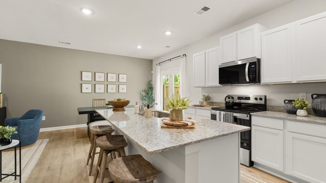 Furnished interior in a model home at Oconee Overlook Townhomes in Gainesville (Image 9).