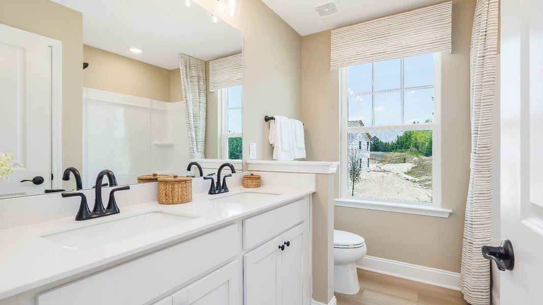 Furnished interior in a model home at The Farm at Neill's Creek in Lillington (Image 26). Furnished interior in a model home at The Farm at Neill's Creek in Lillington (Image 26).