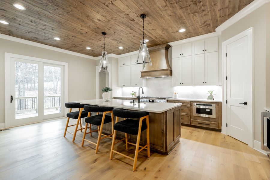 Furnished interior in a model home at River Gorge Ranch in Guild (Image 10).