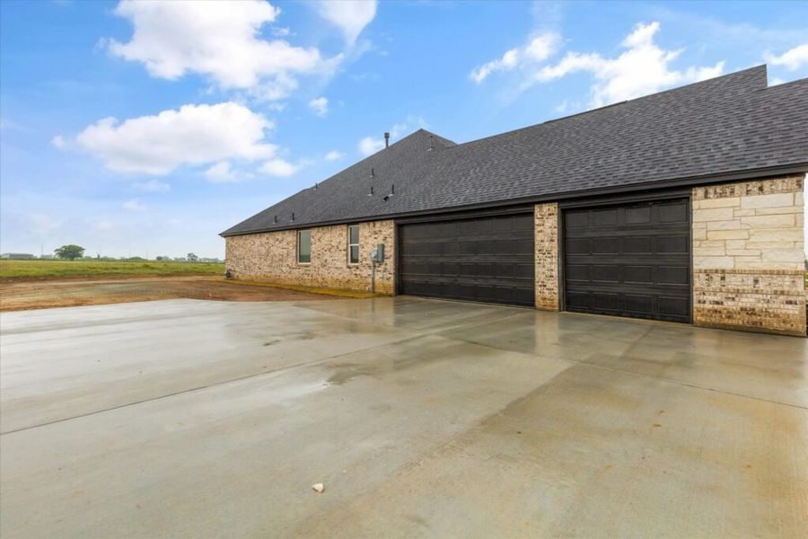 Front exterior of a home in the Wildcat Ridge community, located in Godley, TX (Image 2). Front exterior of a home in the Wildcat Ridge community, located in Godley, TX (Image 2).