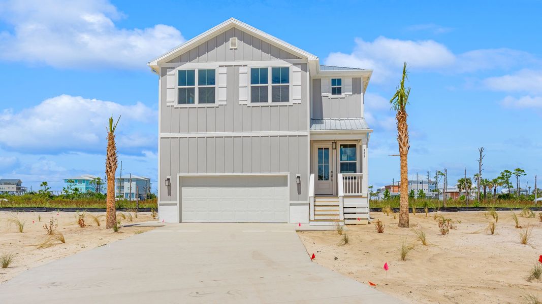 Front exterior of a home in the Redfish Cove at Cape San Blas community, located in Port Saint Joe, FL (Image 12).