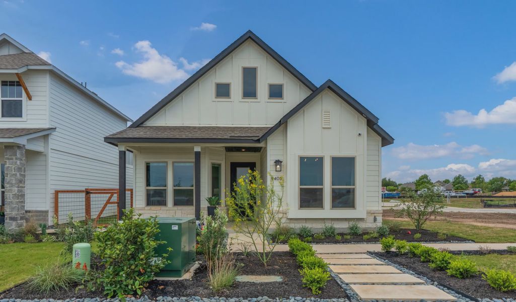Front exterior of a home in the The Crossvine community, located in Schertz, TX (Image 4).