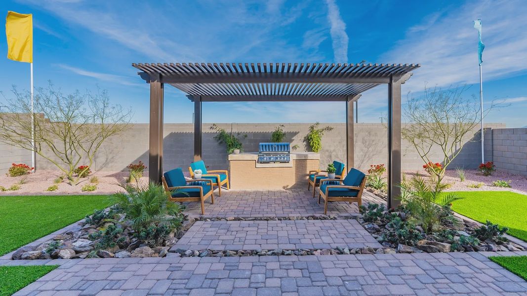 Elegant pergola and sophisticated grill area in luxurious Arroyo Seco Hacienda backyard, framed by refined desert landscape. Elegant pergola and sophisticated grill area in luxurious Arroyo Seco Hacienda backyard, framed by refined desert landscape.