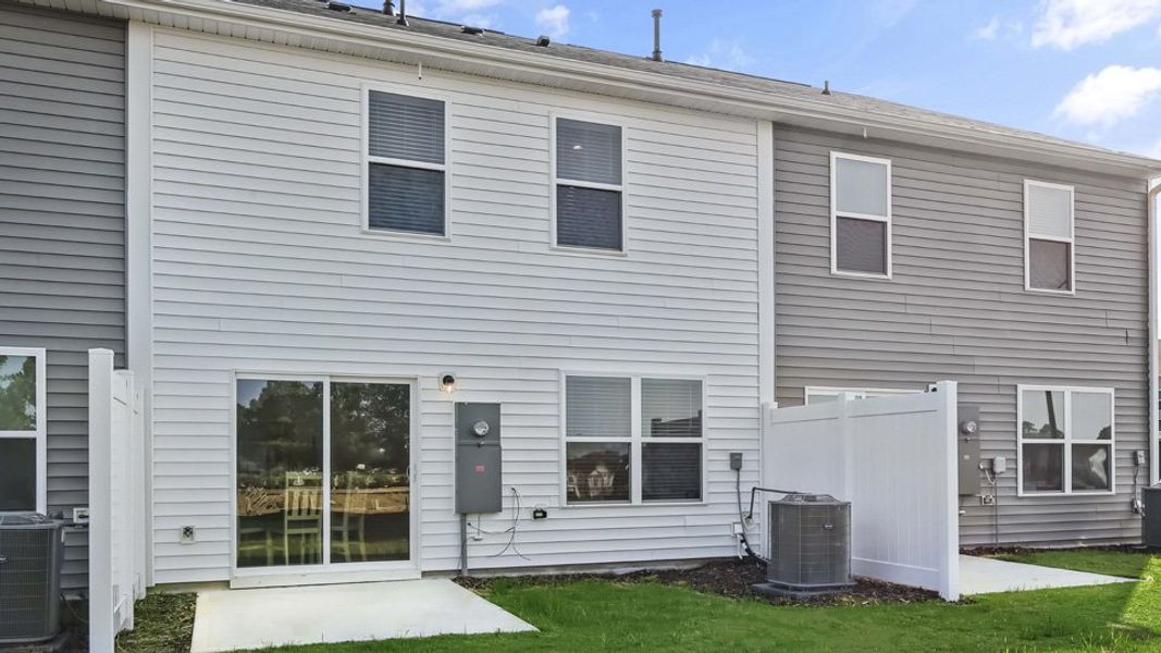 Front exterior of a home in the The Townes at Honeycutt Oaks community, located in Angier, NC (Image 17).