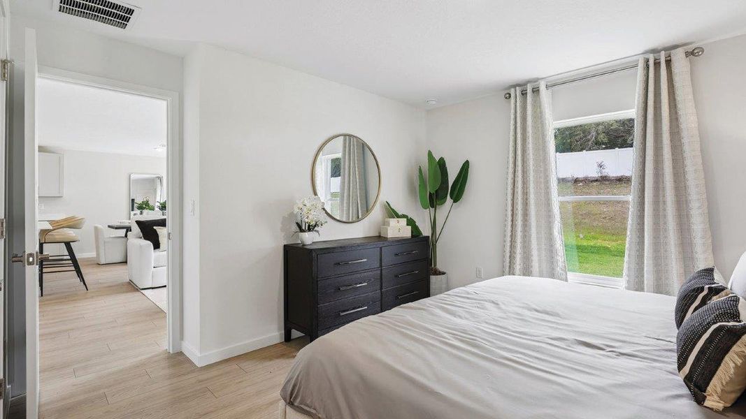 Furnished interior in a model home at Boulevard Oaks in Lady Lake (Image 29). Furnished interior in a model home at Boulevard Oaks in Lady Lake (Image 29).