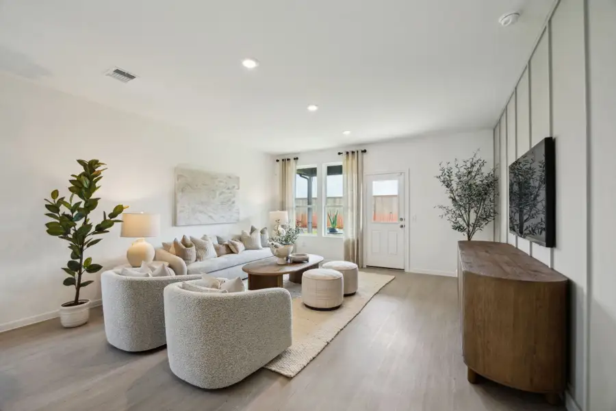 Furnished interior in a model home at Windcress in Cove (Image 17).
