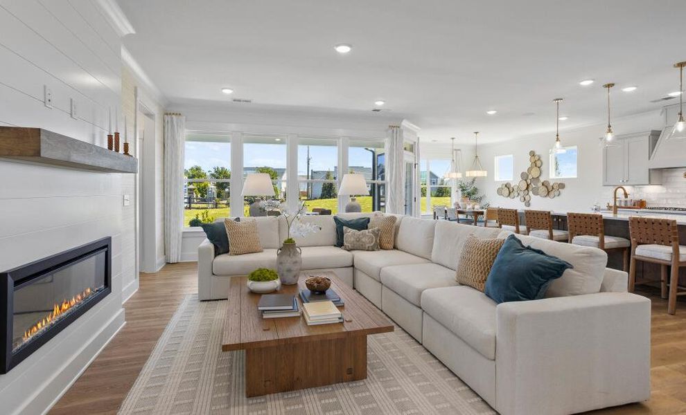 Furnished interior in a model home at The Enclave at Hidden Lake - 55+ Community in Youngsville (Image 6).
