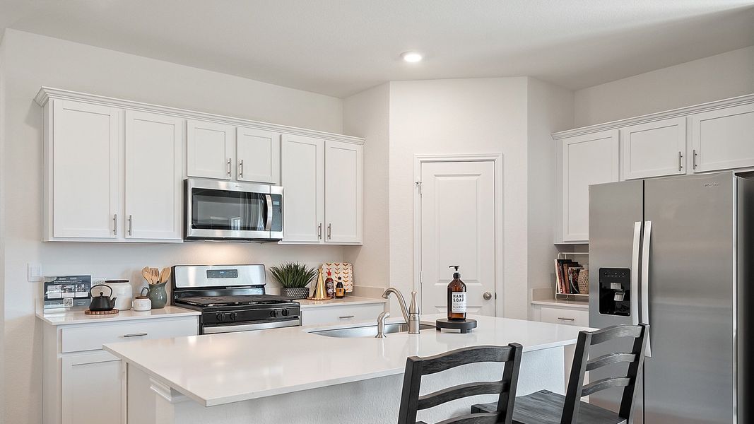 Furnished interior in a model home at Rosenbusch Ranch in Leander (Image 61).