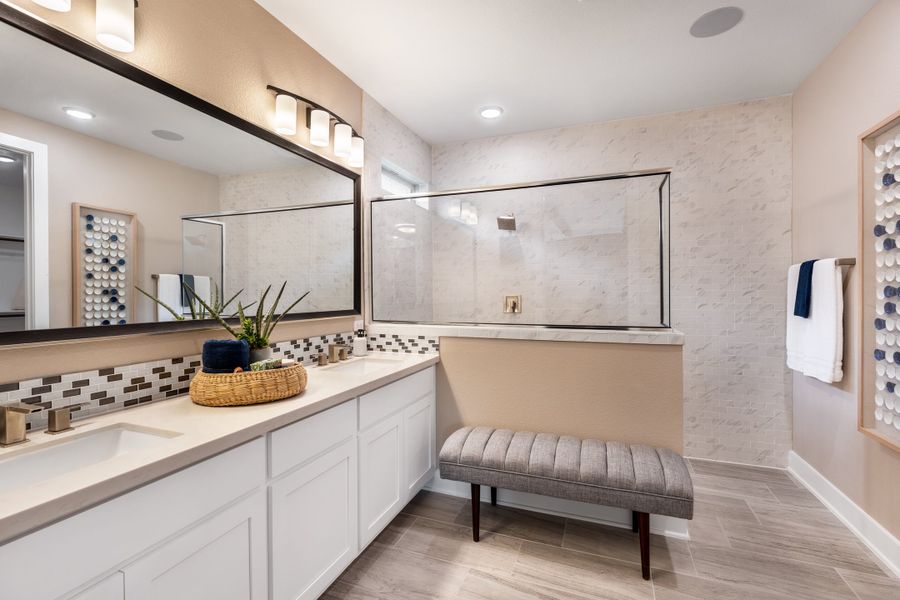 Furnished interior in a model home at Travisso Capri in Leander (Image 13).