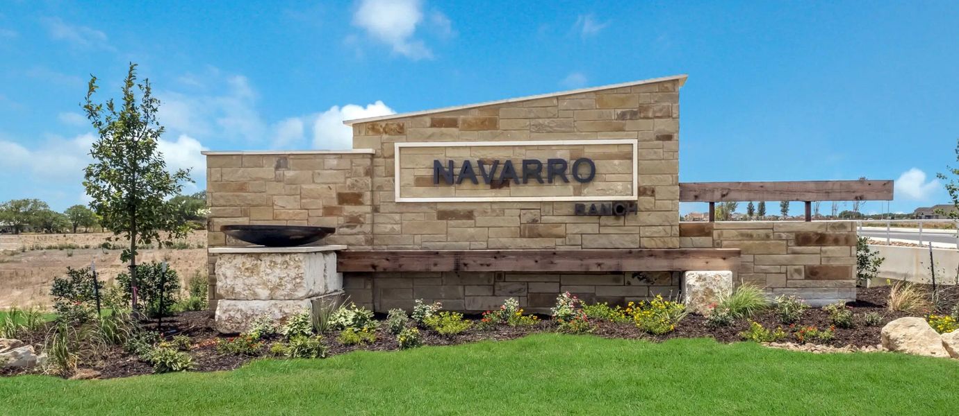 Main entrance to the Navarro Ranch master-planned community in Seguin, TX, featuring its landmark signage (Image 1).